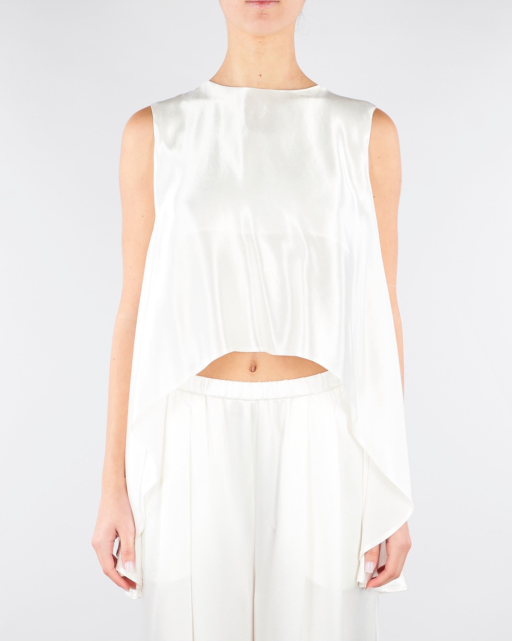 Top Bianco in satin con fondo asimmetrico SS260045 1 ELEH 