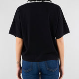 Maglia polo Nero con colletto a contrasto con applicazioni in paillettes SP5NT009 0001 ICONA 