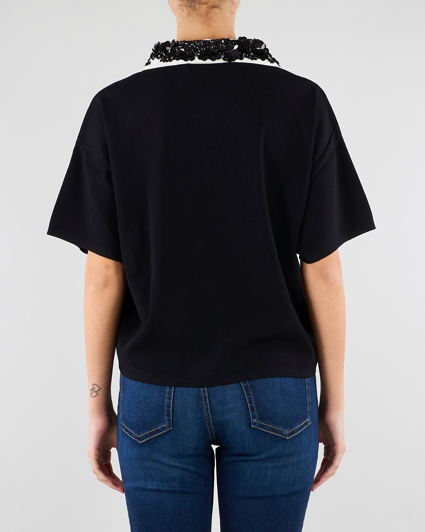 Maglia polo Nero con colletto a contrasto con applicazioni in paillettes SP5NT009 0001 ICONA 