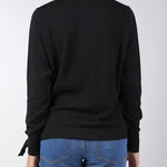 Maglia Nero in pura lana con ricamo gioiello sullo scollo C8355725 1 CLIPS 