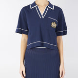 Maglia a polo con profili e stemma