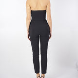 Tuta Nera in crêpe fluido con macro fiocco