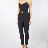 Tuta Nera in crêpe fluido con macro fiocco