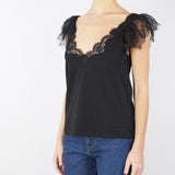 Top in jersey con pizzo