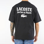 T-shirt Nero loose fit con logo e stampa TH5950 031 LACOSTE 