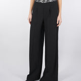 Pantaloni con elastico e baschina in pizzo