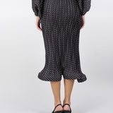 Gonna svasata in plissè stampa pois