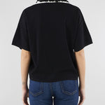 Maglia polo Nero con colletto a contrasto con applicazioni in paillettes SP5NT009 0001 ICONA 