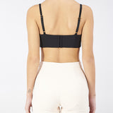 Top in crêpe con fiocchi in raso