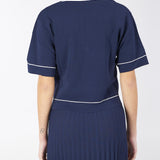 Maglia a polo con profili e stemma