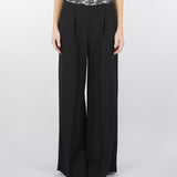 Pantaloni con elastico e baschina in pizzo