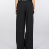 Pantaloni con elastico e baschina in pizzo