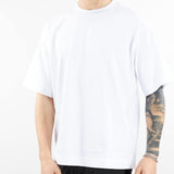 T-shirt loose fit in cotone pesante con ricamo Lacoste