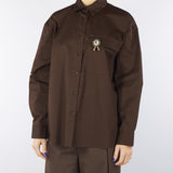 Camicia Moro in cotone con tasca e spilla