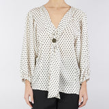 Blusa in stampa pois
